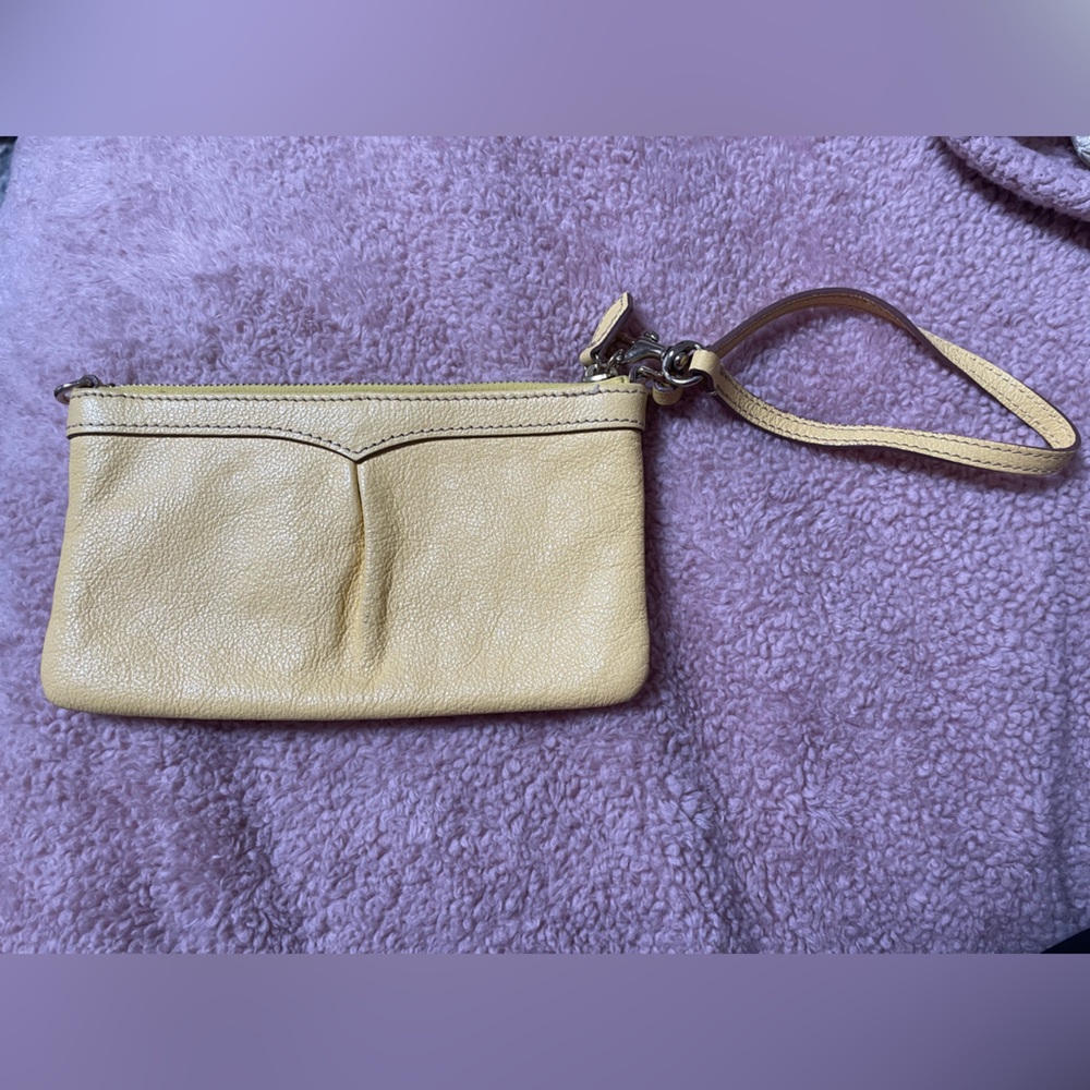 Yellow leather Dooney & Bourke wristlet